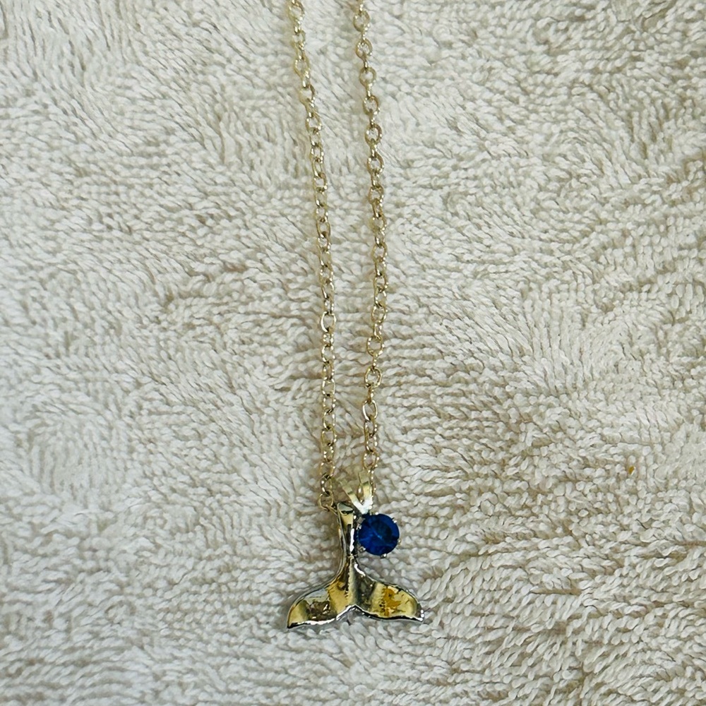 Silver Whale Tail Necklace with Blue Gem